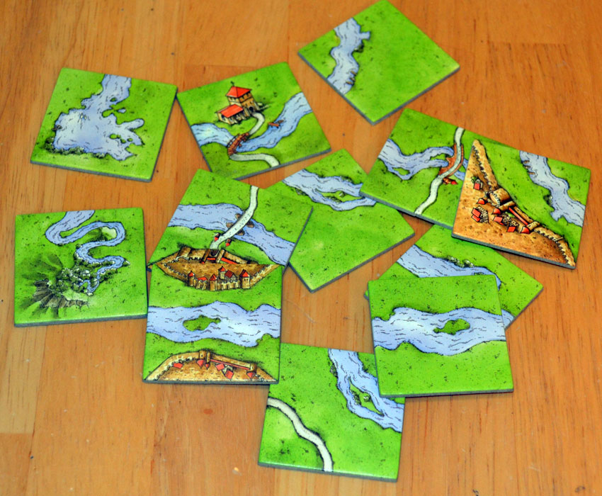 Lil optocht kaart Carcassonne The River mini expansion review - The Board Game Family